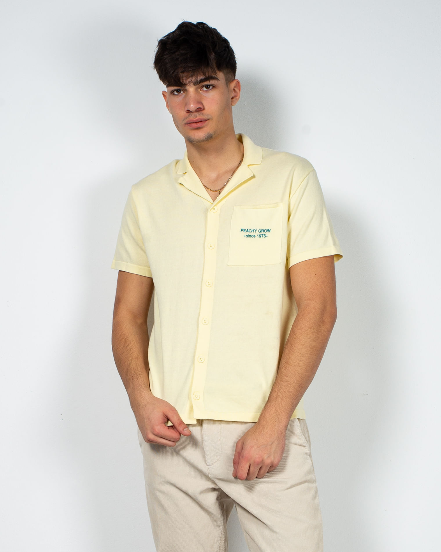 Bluza tricotata cu nasturi si maneca scurta 23KOS35012